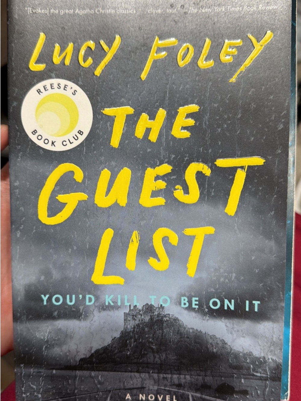 Lucy Foley The Guest List - Black Cover with Yellow Title